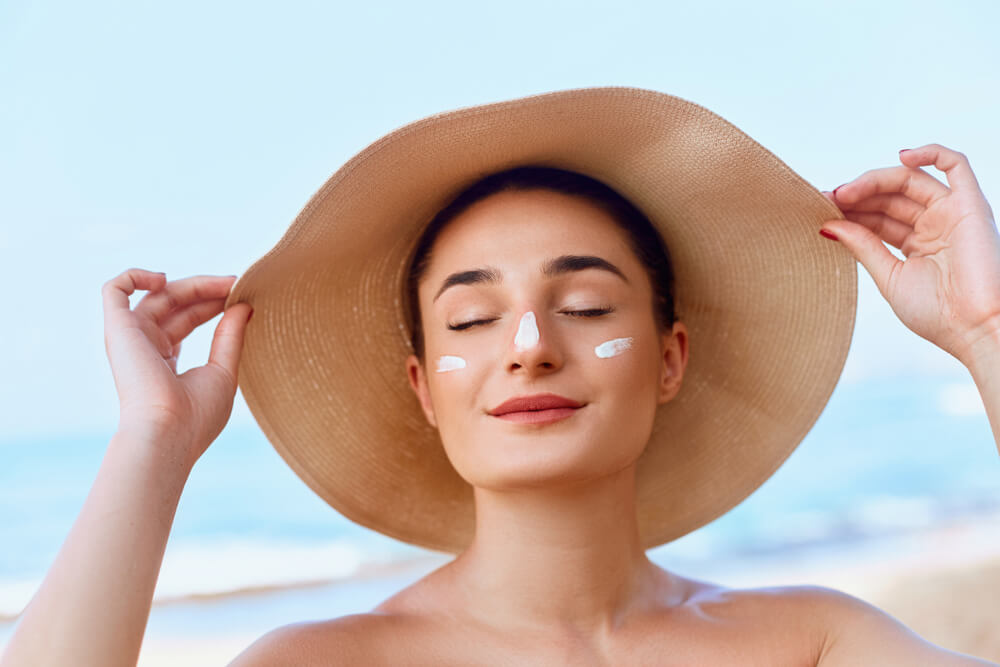 Woman wearing sunscreen