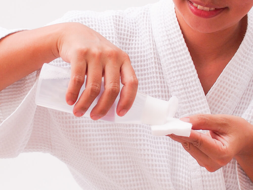 Applying toner to cotton pad