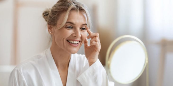 Woman wondering how to treat wrinkle under eye
