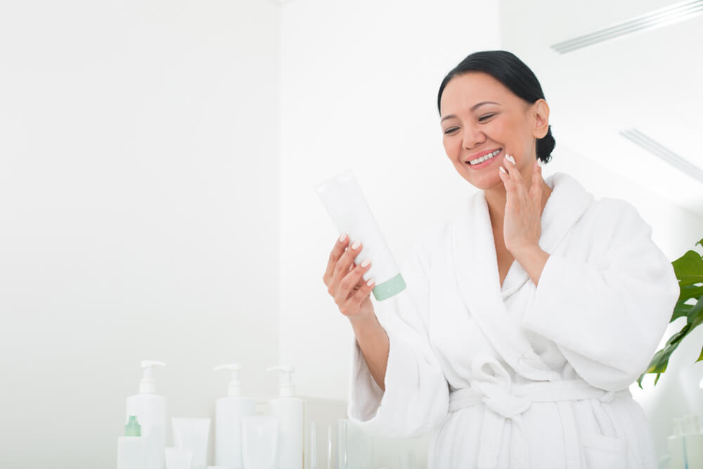 Woman looking at skincare products