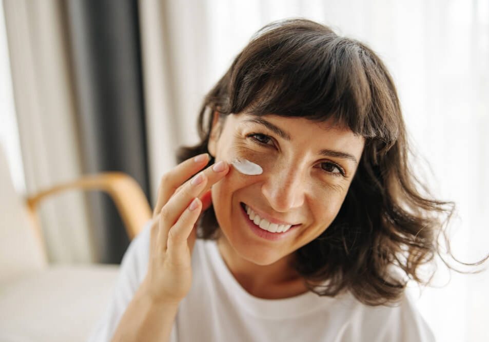 woman applying skincare