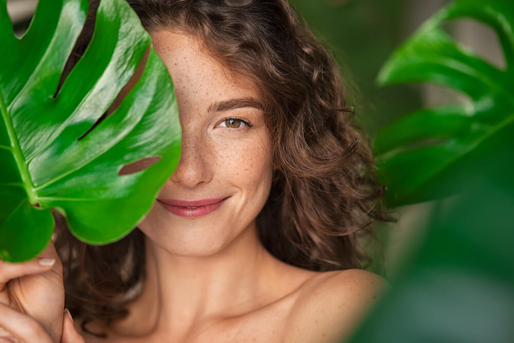 woman smiling leaf