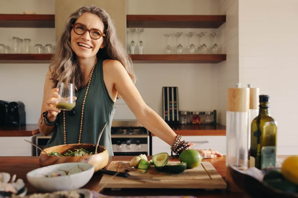 woman standing kitchen