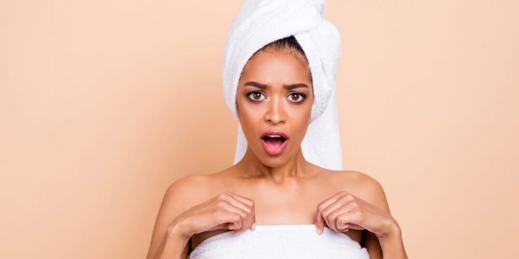 surprised woman in towel